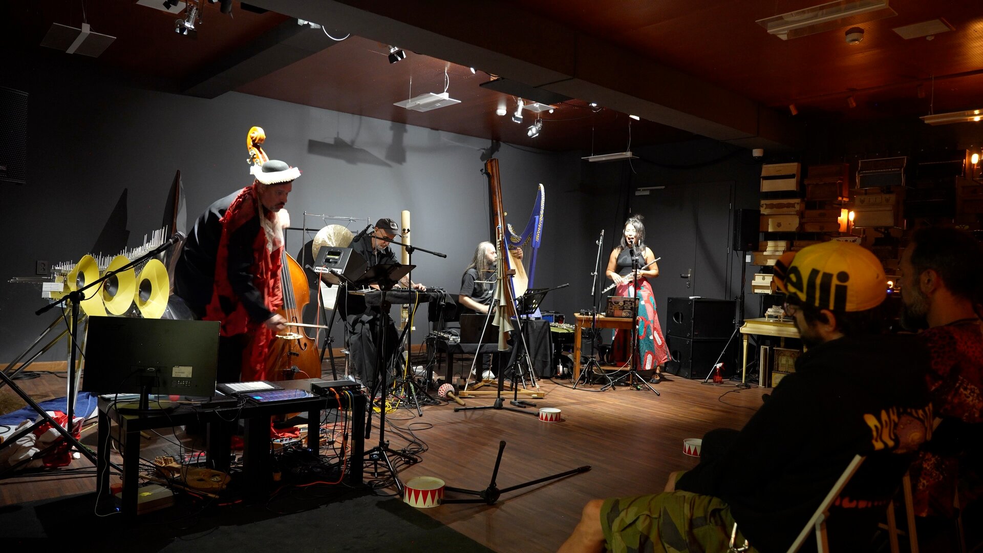 Four KATÁBASIS performers with a double bass, flute, electronics and an extensive array of instruments.